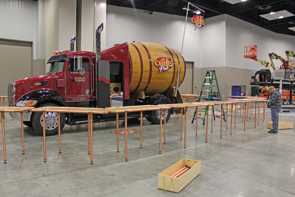 Before you can belly up to the bar, the COLE Pub truck must be unloaded and all the pieces put together.