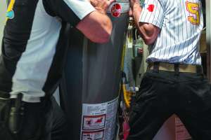 Unique Uniforms, Technology, High-Fives Make Plumbing Company Stand Out