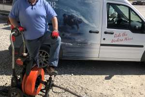 Mike jackson and speedrooter drain machine